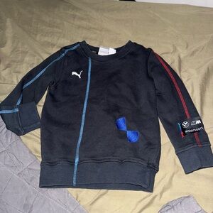 Puma Kids Black Sweatshirt with Blue and Red Accents